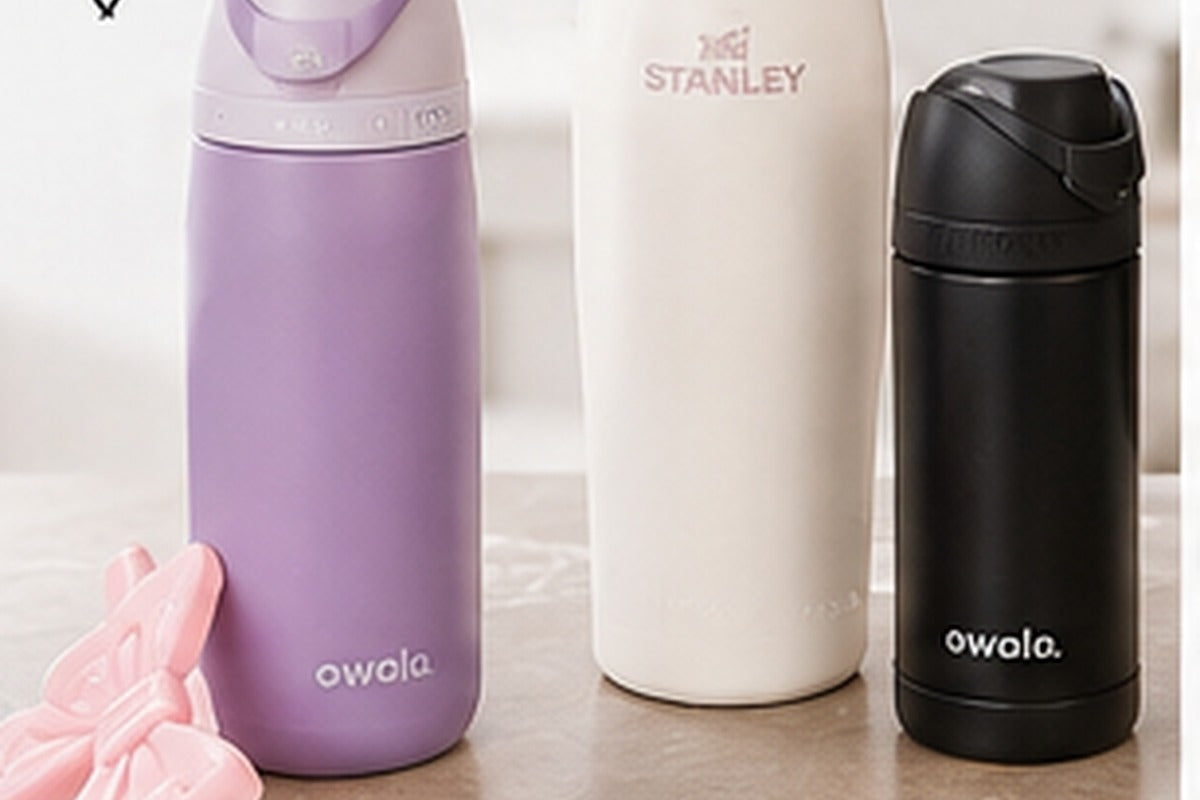 School water bottles and insulated food thermoses arranged for a back-to-school lunch gear comparison