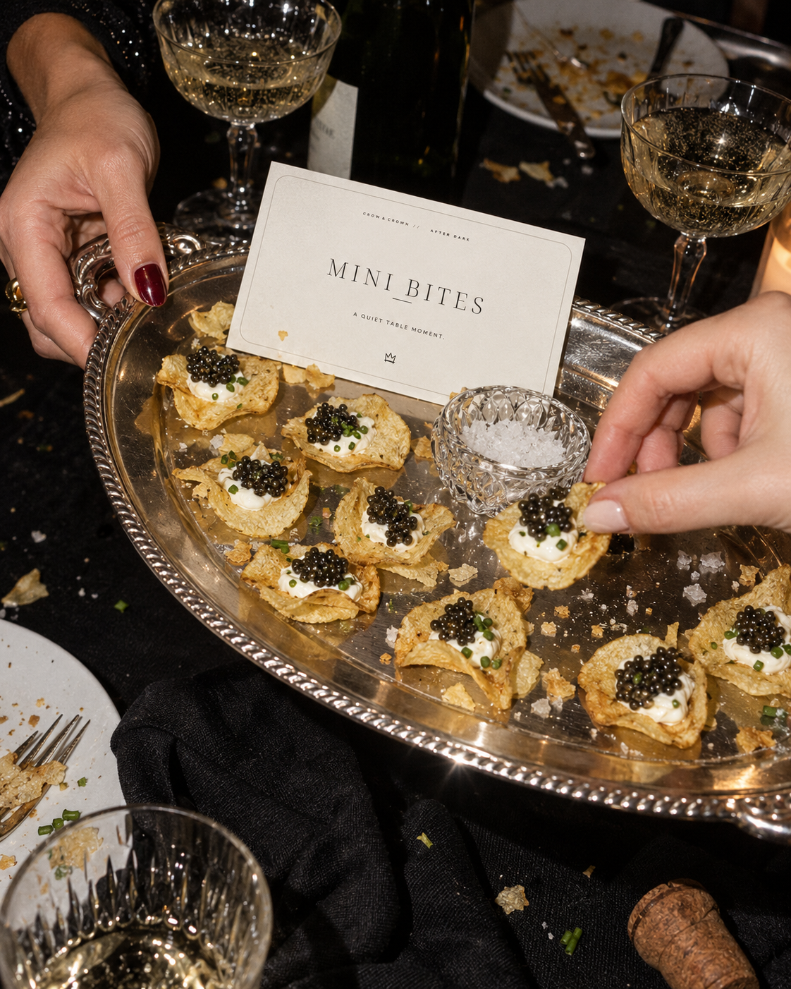 Mini Bites printable food sign beside small canapés on a silver platter