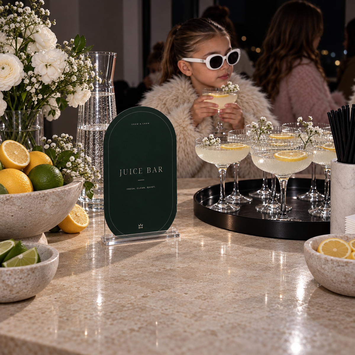 Juice Bar fashion birthday sign with citrus and juice-filled coupe glasses