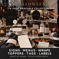 Halloween 76-page printable collection shown across a candlelit food and drink table