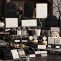 Halloween printable display with near-black station signs, ivory menus and food toppers