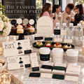 Fashion birthday printable collection with invitations, food labels, cup sleeves and signs at a party