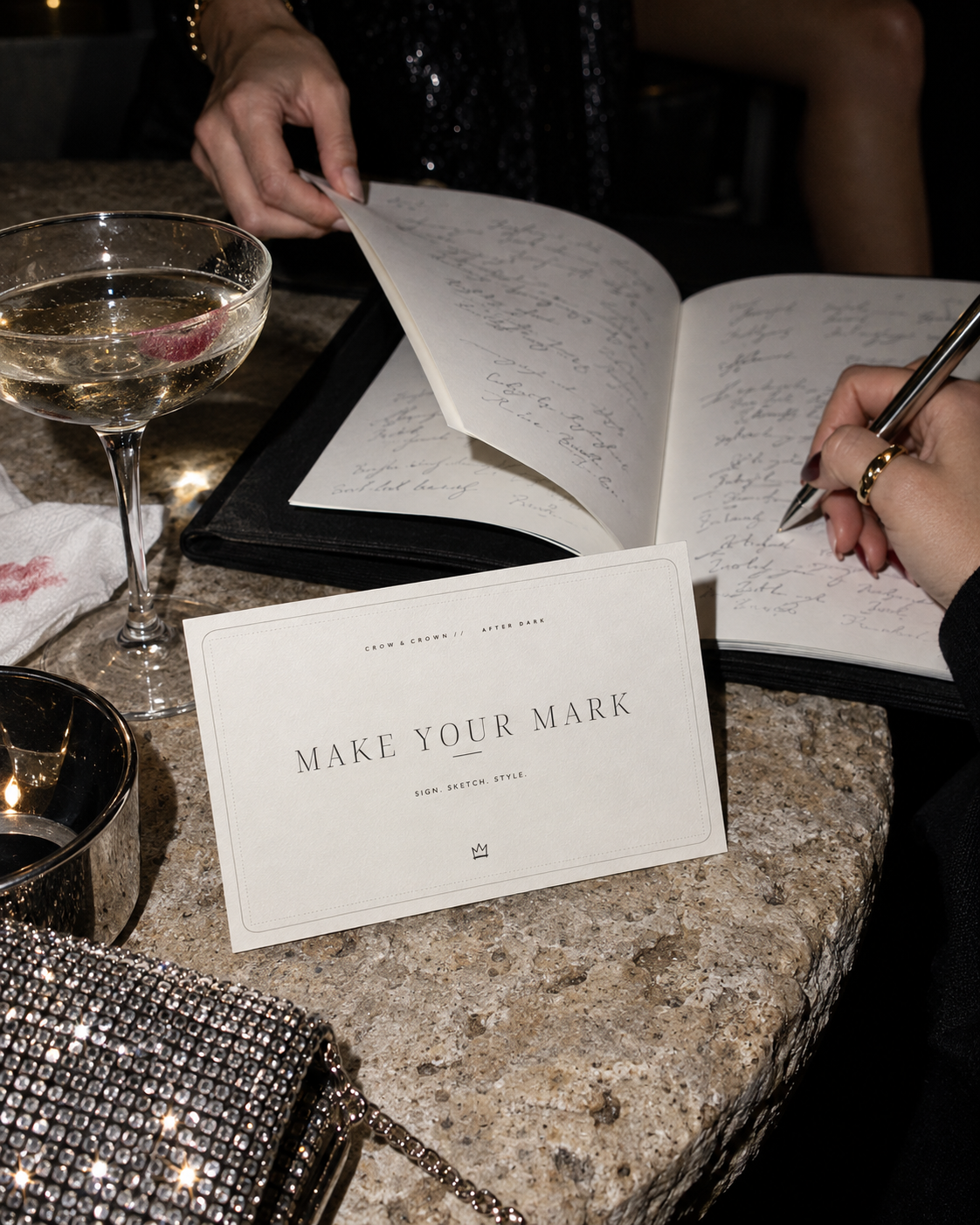 Make Your Mark printable party sign beside an open guestbook and pen