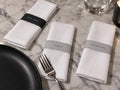 Stay Late, Cheers and After Hours printable napkin bands around white linen napkins