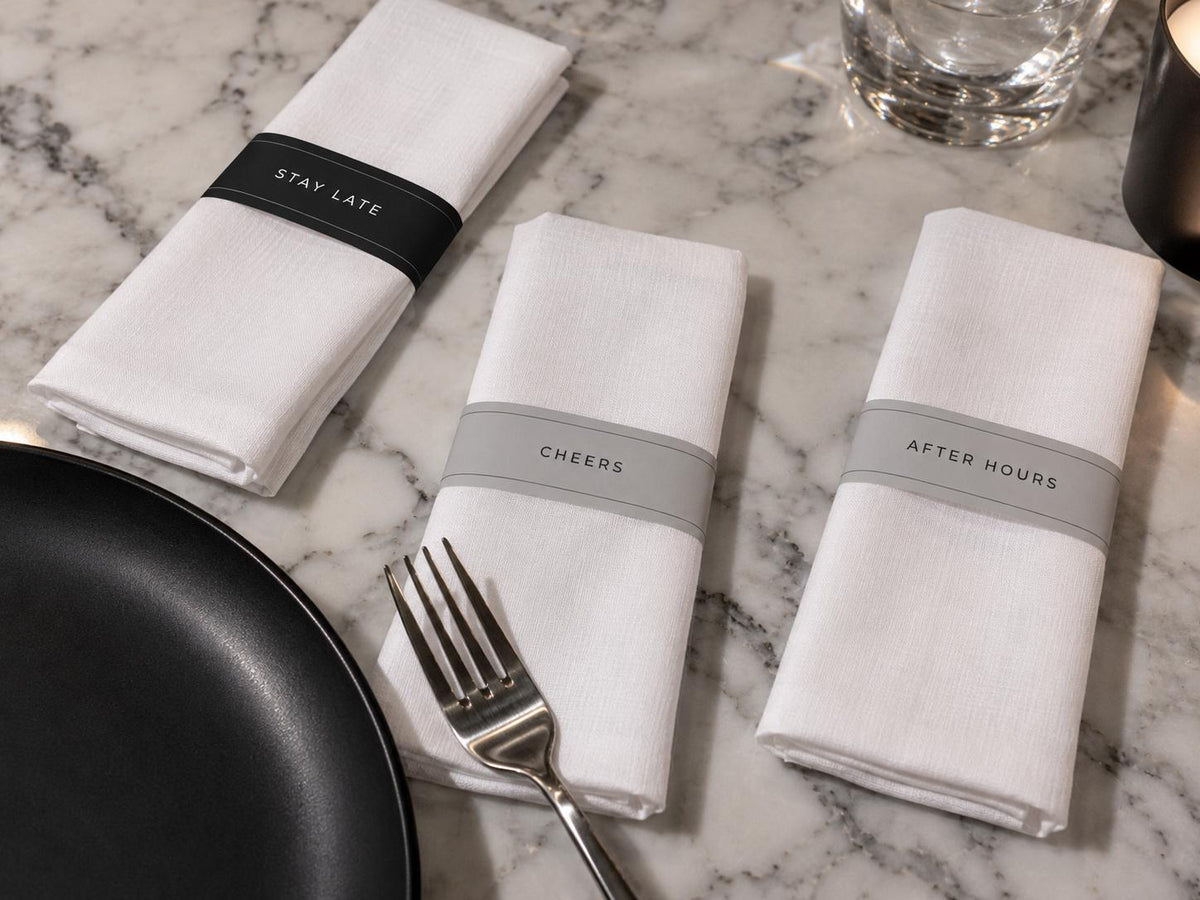 Stay Late, Cheers and After Hours printable napkin bands around white linen napkins
