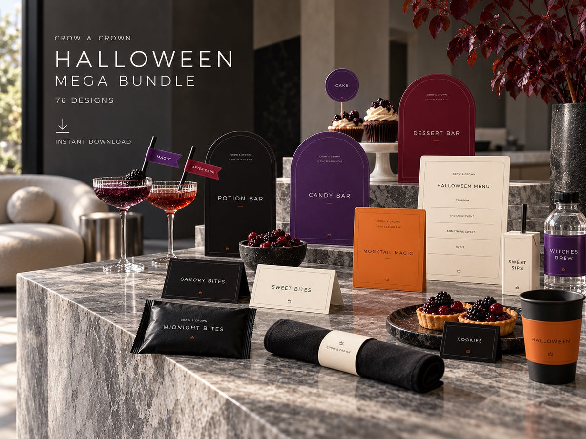 The Halloween Edit printable bundle with purple, burgundy, orange, black and ivory party pieces on marble