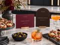 Wine Small Bites and dark Harvest Spritz Thanksgiving printable signs beside crostini and drinks