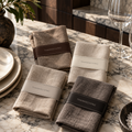 Four Thanksgiving paper napkin accents in espresso, ivory, greige and charcoal