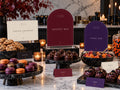 Cookie Cauldron, Dessert Bar and Candy Bar Halloween printables across a dessert counter