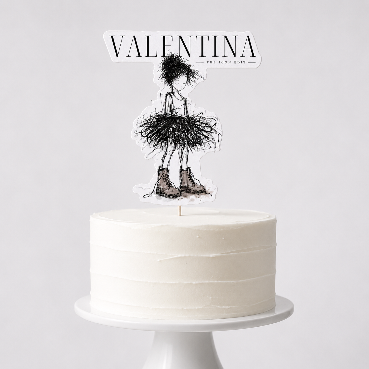 The Icon Edit Layla cake cutout mockup with messy-bun Muse and short-name layout