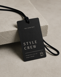 The Icon Edit black Style Crew tag mockup on stone surface